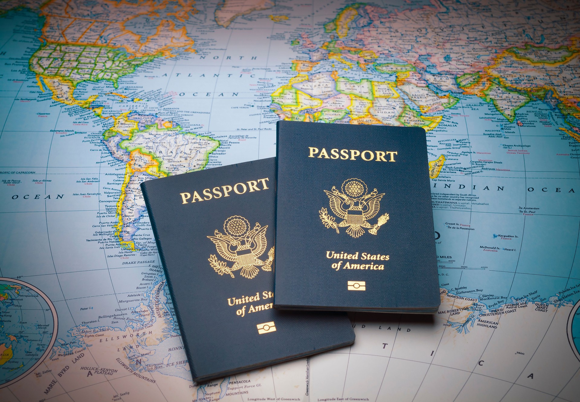 Passports on a map of the world