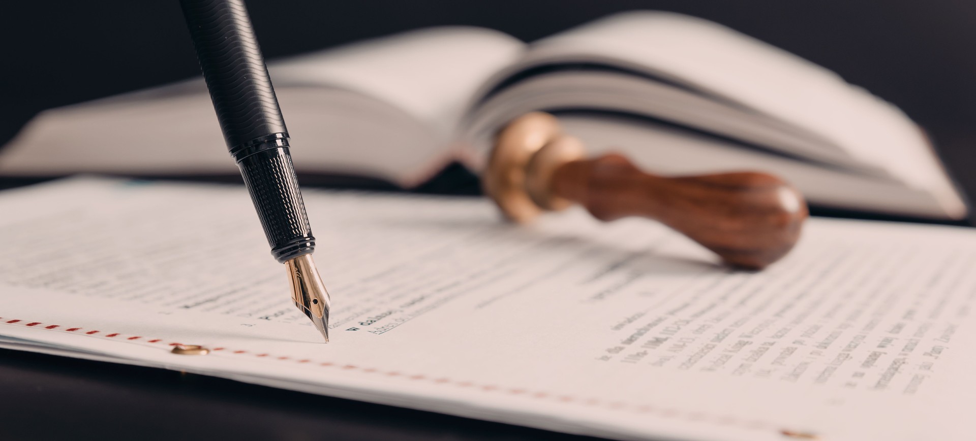 Agreement concept with fountain pen and documents